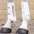 Air-velox-single-locking-brushing-boots-white-1_1600x.webp